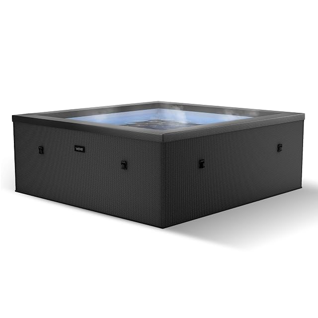 Charcoal black WAVE Garda foam-insulated portable hot tub on a terrace