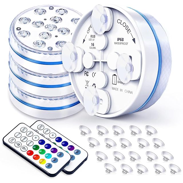 Joycome underwater pool light with magnet and suction cup fixings beside an RF remote
